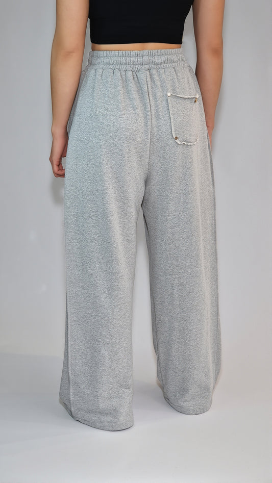 Calças de Perna Larga em Malha Fluida com Ajuste na Bainha